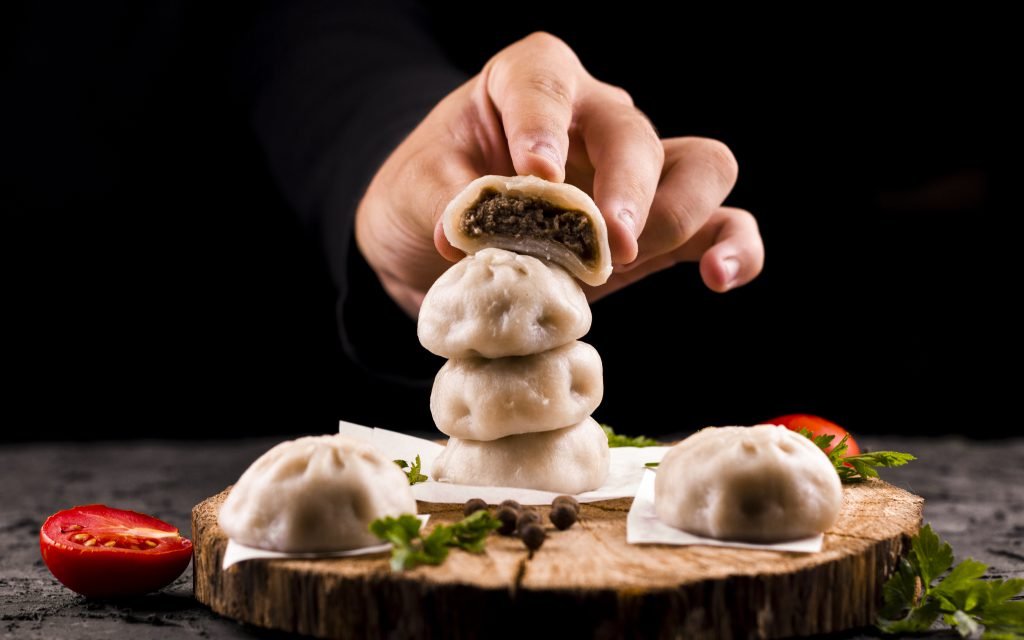 hand-holding-meat-dumpling