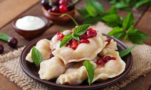 Delicious dumplings with cherries and jam.